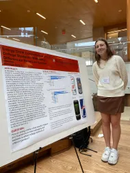 Amanda Gary presents her poster at the symposium
