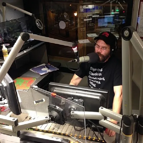 Nathaniel Farrell on air at the radio station